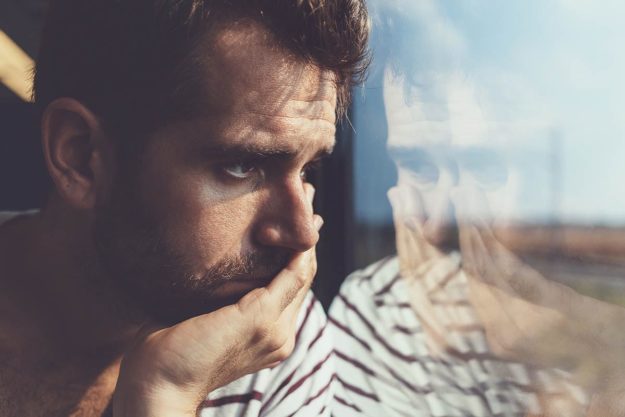 3 Signs of Heroin Addiction a man suffers from the signs of heroin addiction