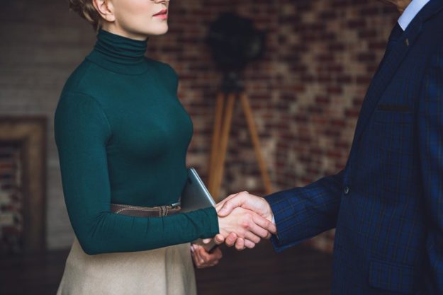 Benefits of an Evening IOP for a Busy Schedule woman shaking hands with male