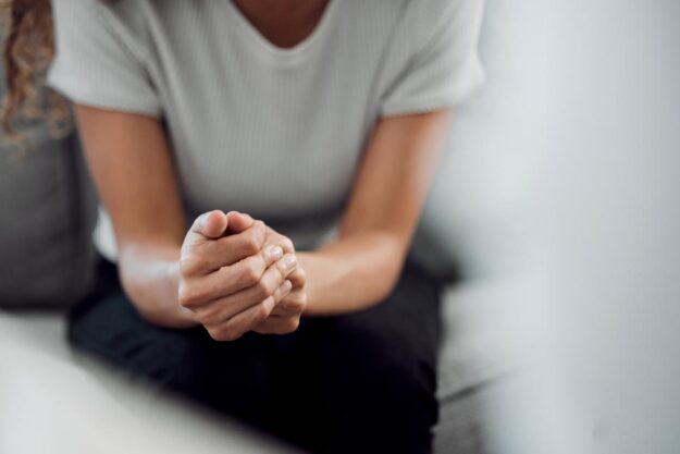 Top 10 Drugs That Cause Kidney Damage person with hands folded learning about the top 10 drugs that cause kidney damage