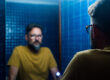 person looking in mirror wondering what to expect when you quit drinking