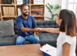 person shaking hands with clinician after learning about levels of care in addiction treatment