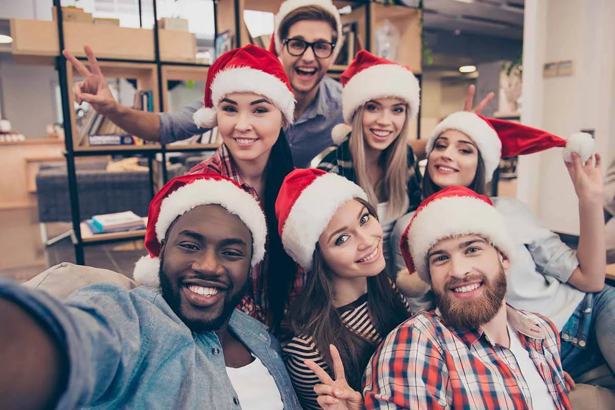 a group celebrates a sober holiday season